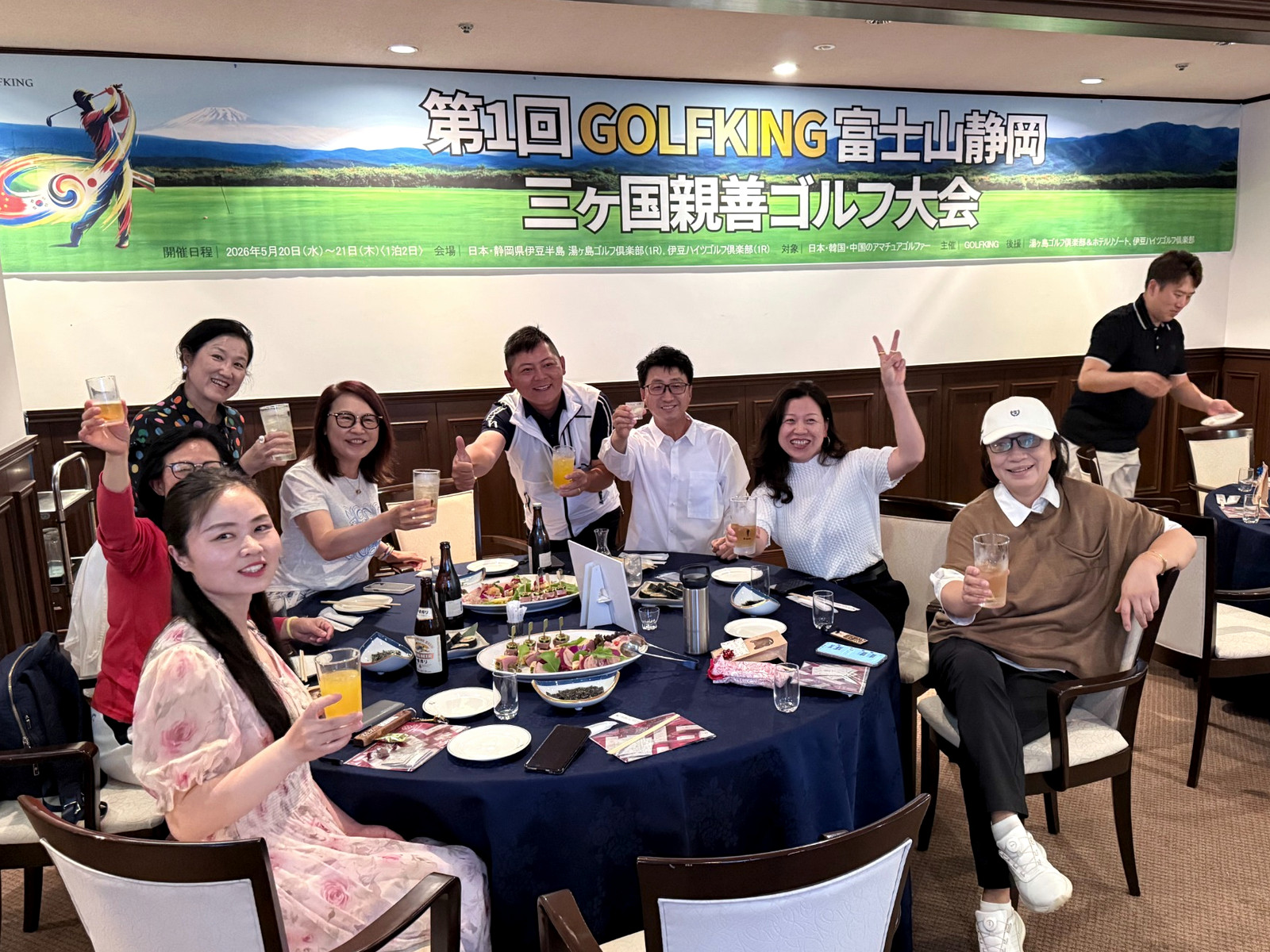 Participants sharing dinner and conversation during the tournament